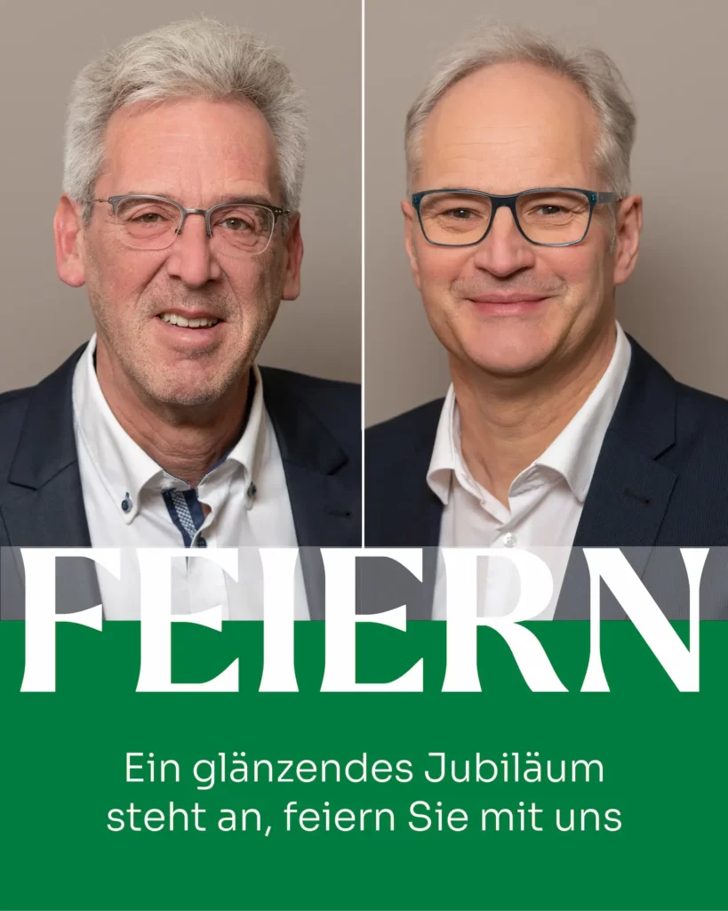 Herr Becker und Herr Ruegenberg mit weißem Hemd und dunkelfarbenen Sakko